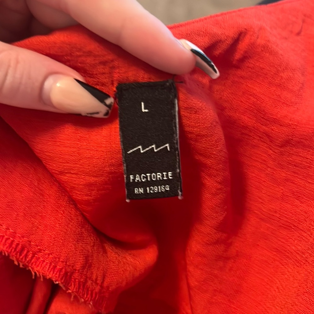 Factory Dress from SA. Says size large but fits like an american size Meduim